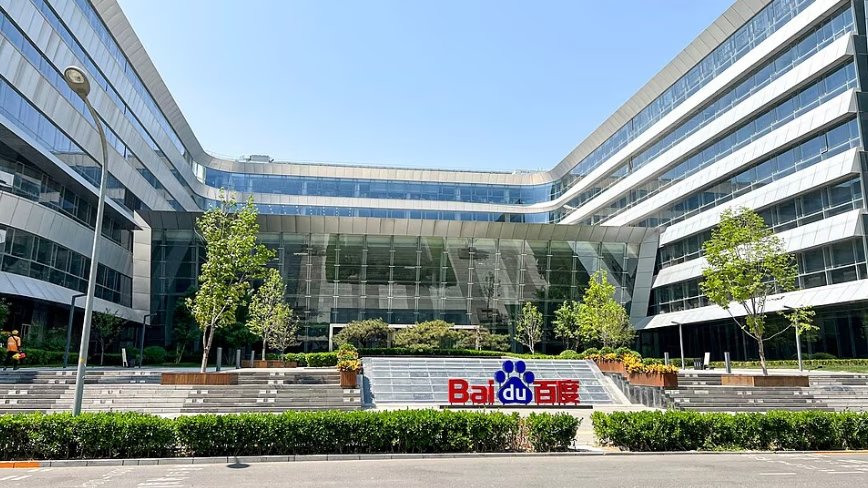 A single computer chip wearing a tiny salesman's tie, ringing a stock-exchange bell.